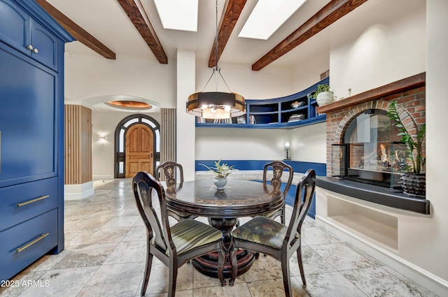 dining room with beamed ceiling