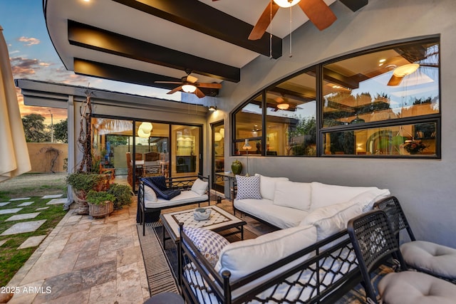 patio terrace at dusk with outdoor lounge area