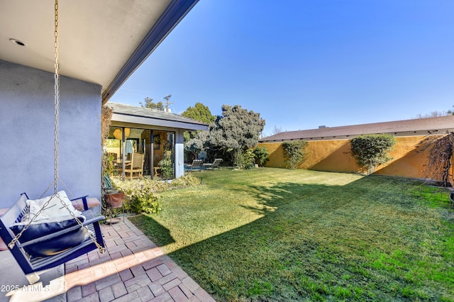 view of yard with a patio area