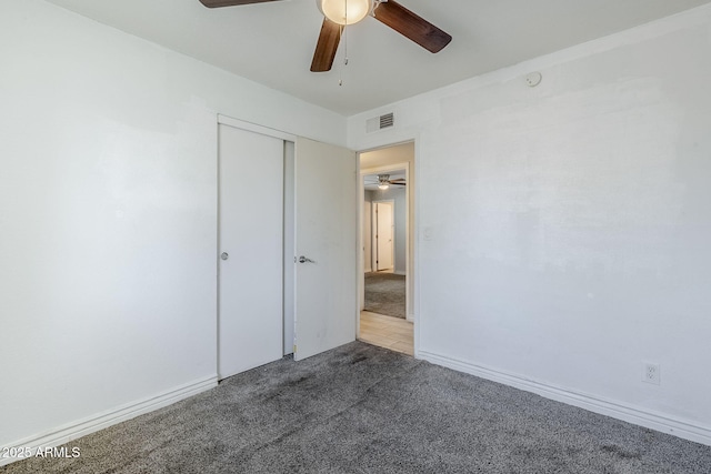 7135 W Flower St, Phoenix, AZ 85033 - unfurnished bedroom featuring carpet floors, a closet, and a ceiling fan