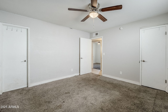 7135 W Flower St, Phoenix, AZ 85033 - unfurnished bedroom with carpet, baseboards, and a ceiling fan