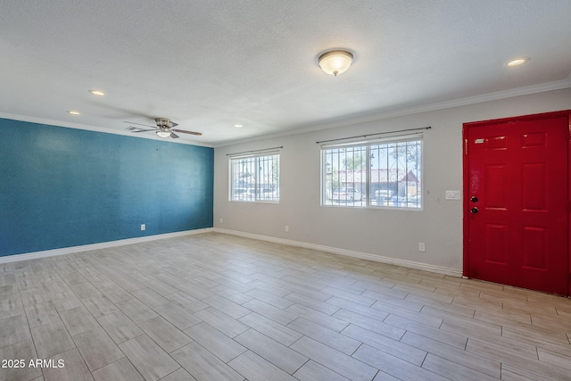 7135 W Flower St, Phoenix, AZ 85033 - foyer entrance with crown molding, ceiling fan, baseboards, recessed lighting, and light wood-type flooring