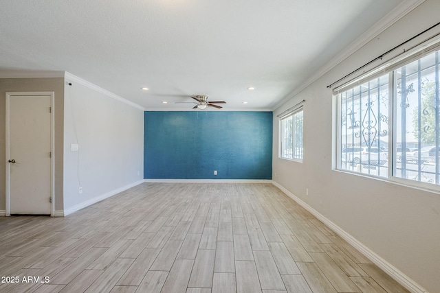7135 W Flower St, Phoenix, AZ 85033 - unfurnished room with ornamental molding, light wood-style flooring, ceiling fan, recessed lighting, and baseboards