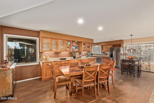 dining area featuring dark hardwood / wood-style floors