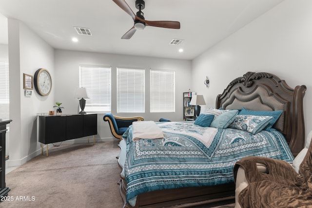 bedroom with light colored carpet and ceiling fan