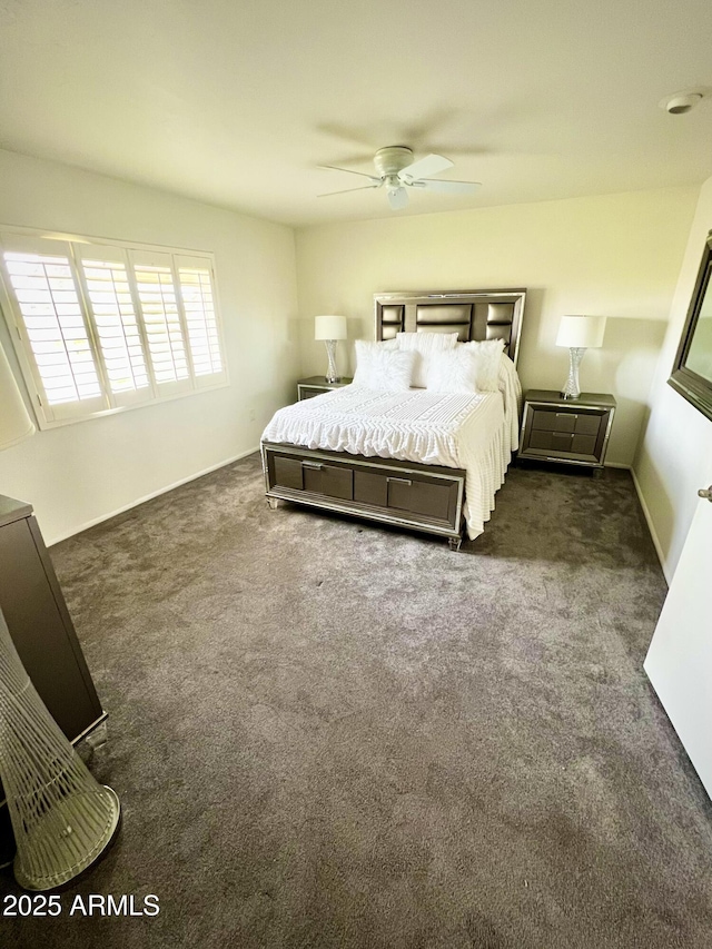 bedroom with ceiling fan and carpet