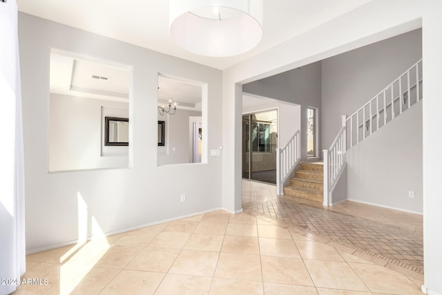 interior space featuring an inviting chandelier