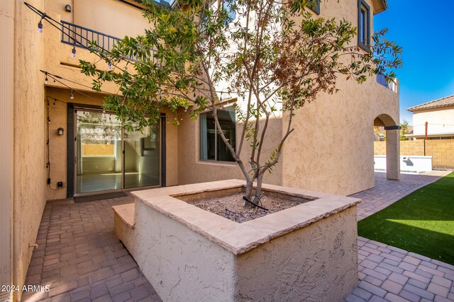 view of patio with a balcony