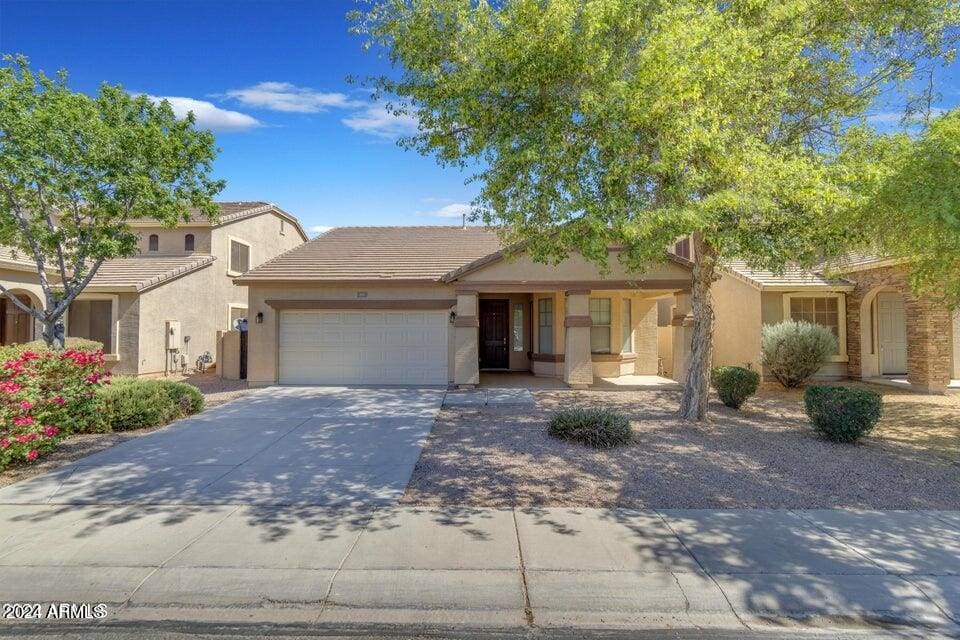 view of front of home with a garage