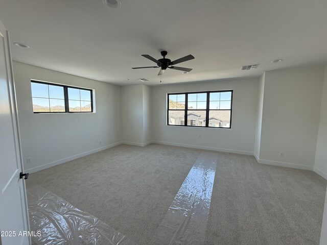 26655 S 169th Pl, Queen Creek, AZ 85142 - empty room with ceiling fan, light colored carpet, baseboards, and visible vents