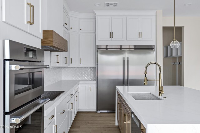 26655 S 169th Pl, Queen Creek, AZ 85142 - kitchen featuring white cabinets, stainless steel appliances, visible vents, and light countertops