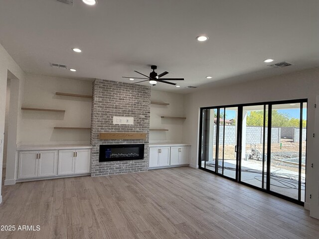 26655 S 169th Pl, Queen Creek, AZ 85142 - unfurnished living room with recessed lighting, visible vents, a ceiling fan, and light wood-style flooring