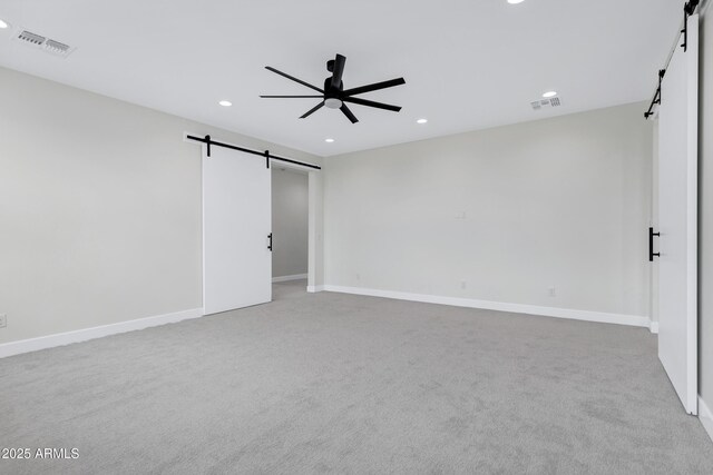 26655 S 169th Pl, Queen Creek, AZ 85142 - carpeted spare room featuring a barn door, visible vents, a ceiling fan, and recessed lighting