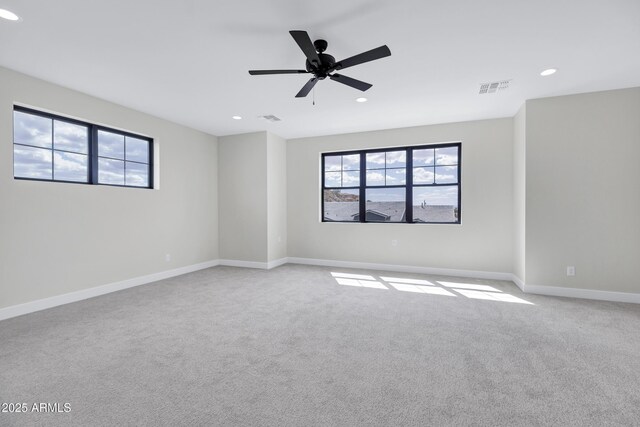 26655 S 169th Pl, Queen Creek, AZ 85142 - unfurnished room featuring recessed lighting, visible vents, carpet flooring, and a wealth of natural light