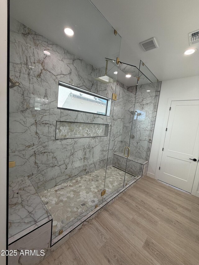 26655 S 169th Pl, Queen Creek, AZ 85142 - bathroom with a marble finish shower, visible vents, and wood finished floors