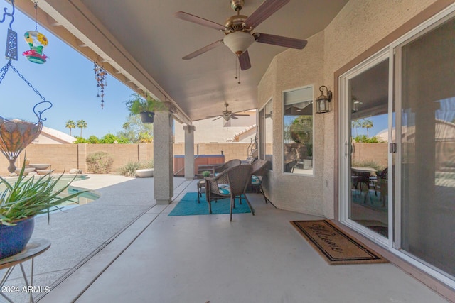 view of patio / terrace with a fenced backyard and a ceiling fan