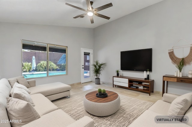 1962 E Morrow Dr, Phoenix, AZ 85024 - living room with ceiling fan and vaulted ceiling