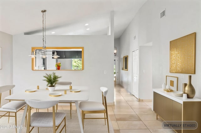 1962 E Morrow Dr, Phoenix, AZ 85024 - dining room with light tile patterned flooring, baseboards, recessed lighting, and a towering ceiling