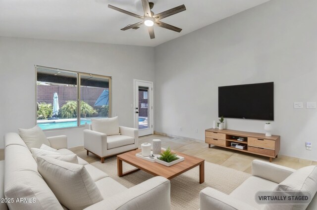 1962 E Morrow Dr, Phoenix, AZ 85024 - living room with a ceiling fan, light wood-style flooring, and lofted ceiling