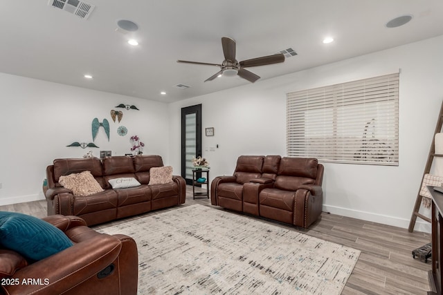 935 Calle Azul, Wickenburg, AZ 85390 - living room featuring light wood-type flooring, visible vents, and recessed lighting