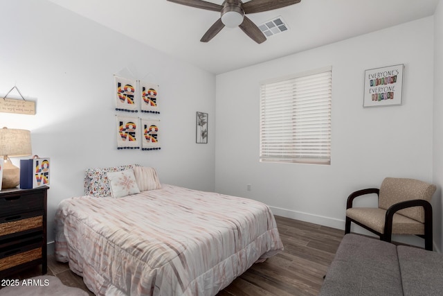 935 Calle Azul, Wickenburg, AZ 85390 - bedroom with a ceiling fan, dark wood-style flooring, visible vents, and baseboards