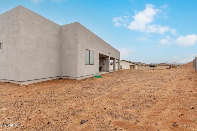 935 Calle Azul, Wickenburg, AZ 85390 - rear view of property with fence and stucco siding