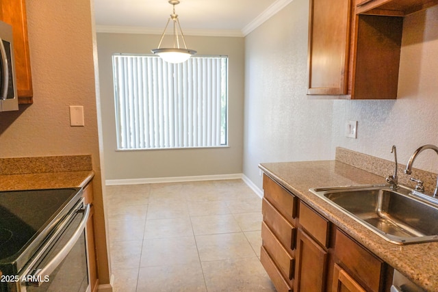 kitchen with sink, light tile patterned floors, hanging light fixtures, and ornamental molding