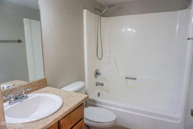 full bathroom featuring vanity, toilet, and bathtub / shower combination