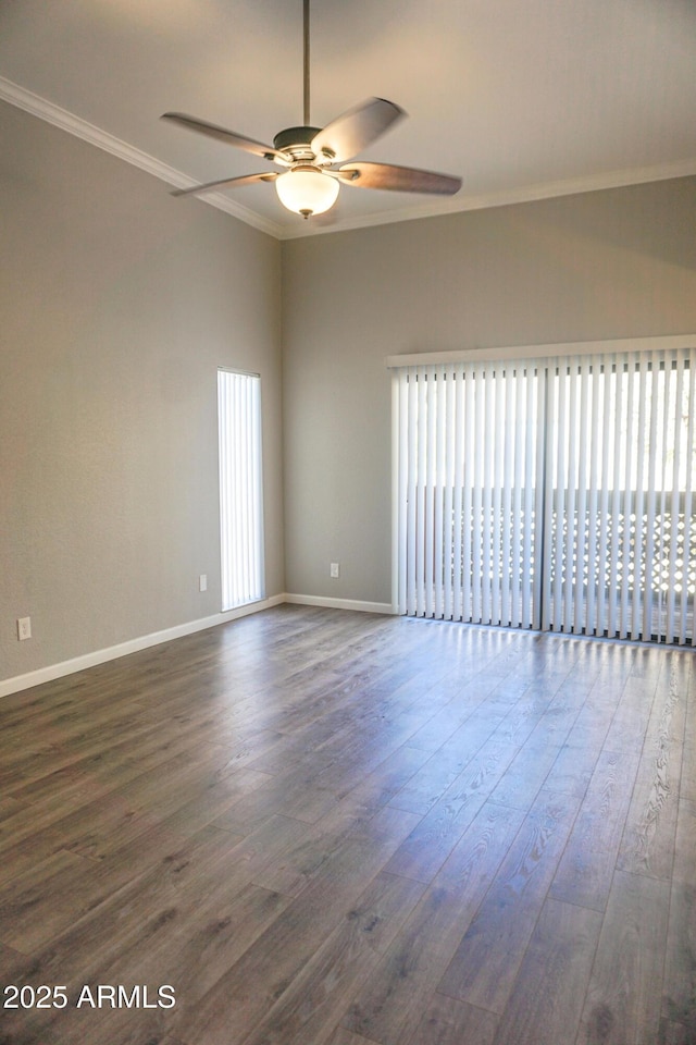 unfurnished room with ceiling fan, dark hardwood / wood-style flooring, and ornamental molding