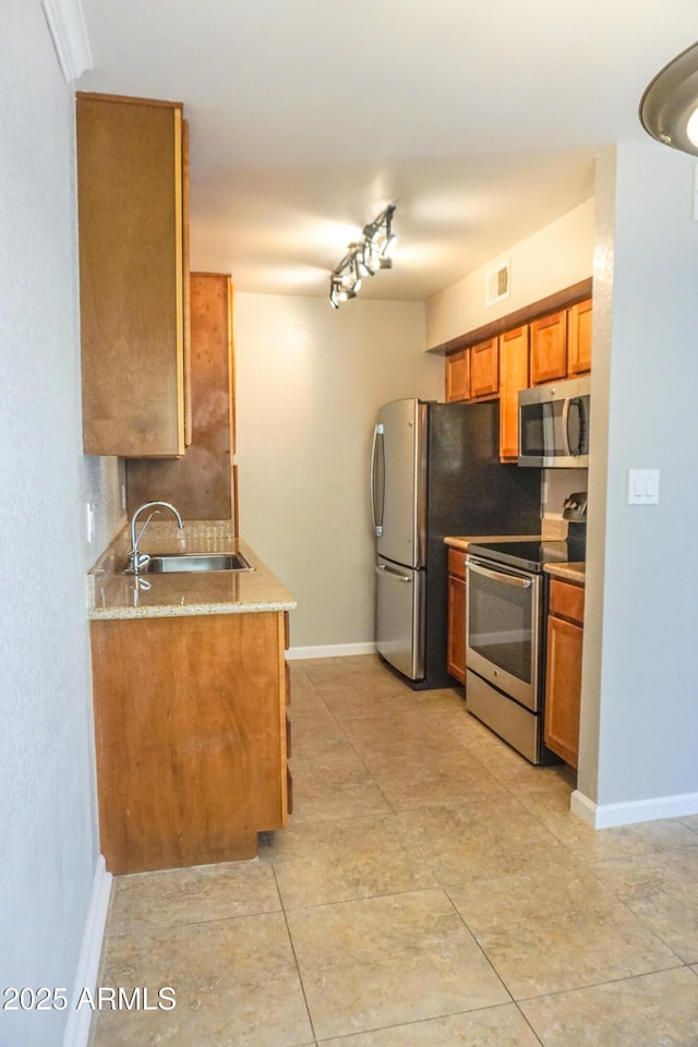 kitchen featuring sink and appliances with stainless steel finishes