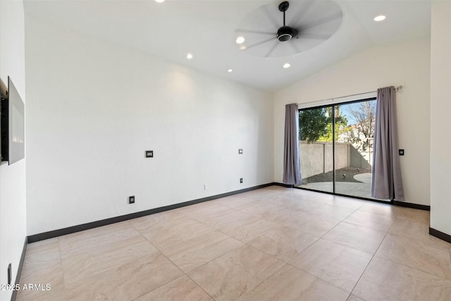 spare room featuring ceiling fan and lofted ceiling