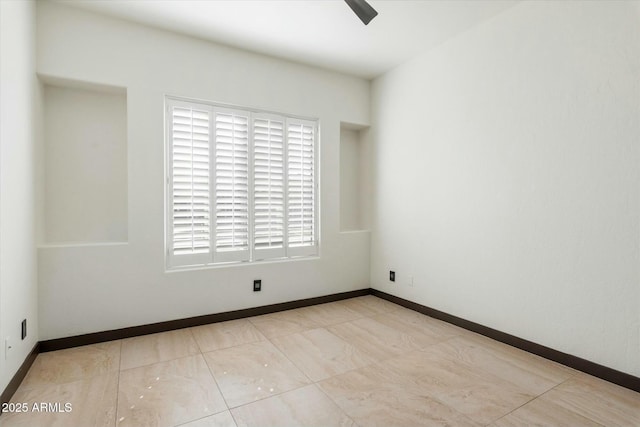 view of tiled spare room