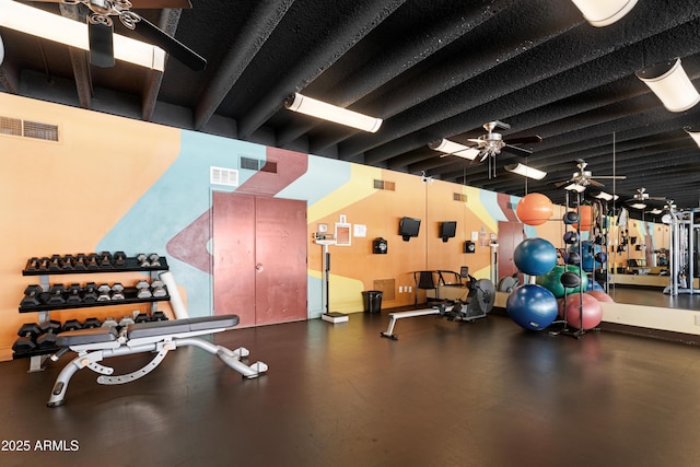 workout area featuring visible vents and ceiling fan