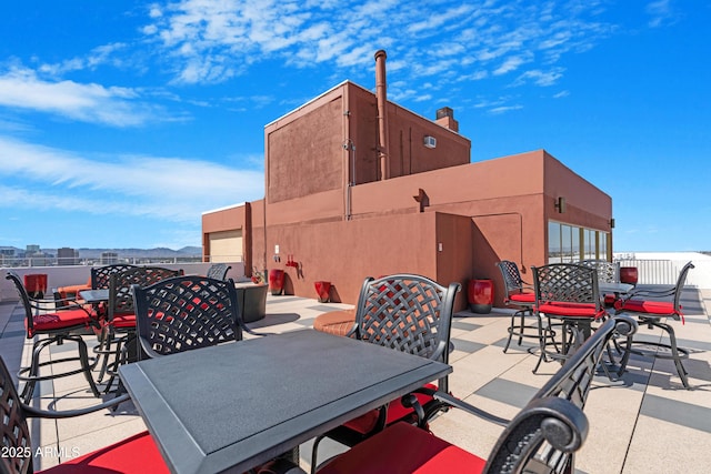 view of patio featuring outdoor dining space