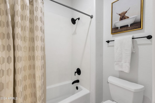 bathroom with toilet and shower / bathtub combination with curtain