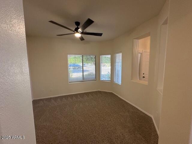 20985 N 81st Dr, Peoria, AZ 85382 - unfurnished room with ceiling fan, carpet flooring, and baseboards