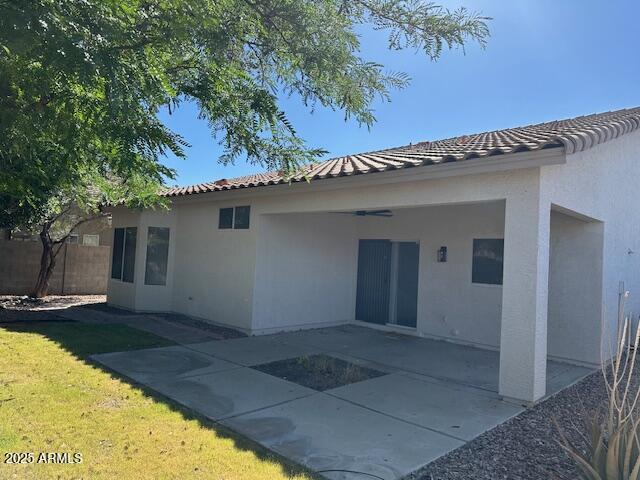 20985 N 81st Dr, Peoria, AZ 85382 - back of house with a patio area, stucco siding, and a tile roof