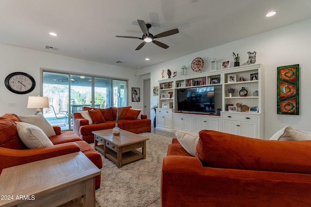 living room with ceiling fan