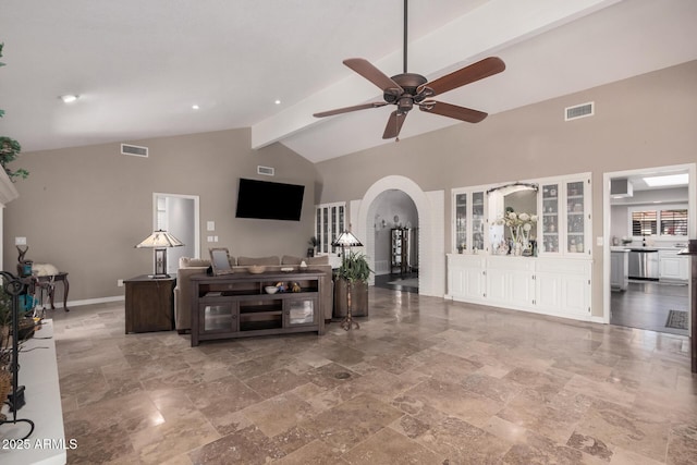 living room with beam ceiling, high vaulted ceiling, and ceiling fan