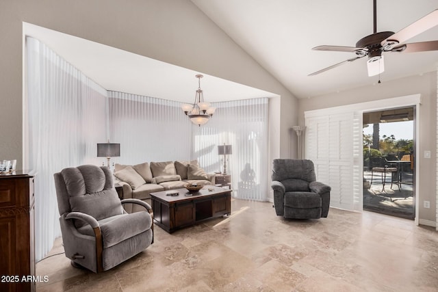 living room with vaulted ceiling and ceiling fan with notable chandelier