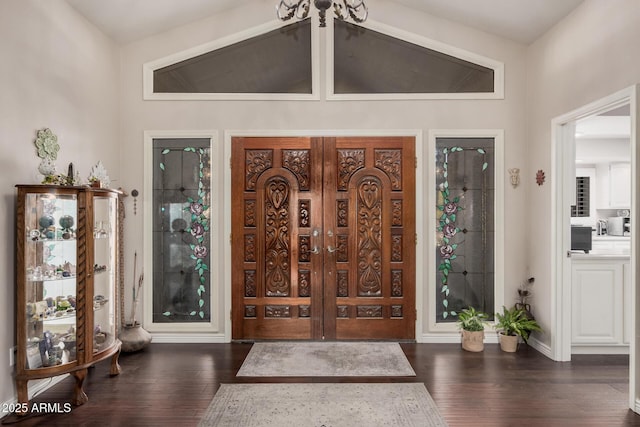 foyer with dark hardwood / wood-style flooring