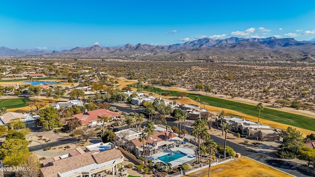 birds eye view of property featuring a mountain view