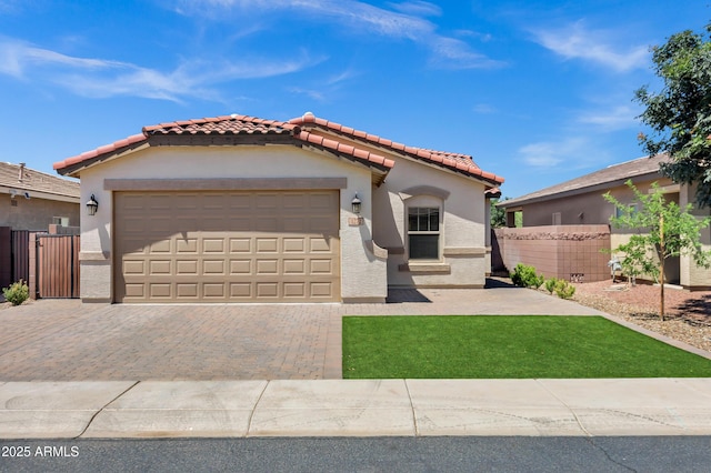 1272 W Joshua Tree Ave, Queen Creek, AZ 85140 - mediterranean / spanish house featuring a tile roof, stucco siding, and fence