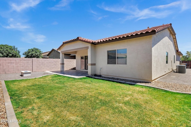 1272 W Joshua Tree Ave, Queen Creek, AZ 85140 - back of house with a patio, a tiled roof, stucco siding, and central AC unit