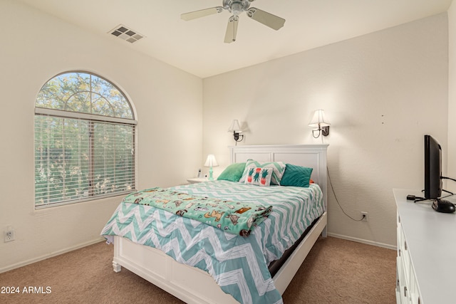 carpeted bedroom featuring ceiling fan