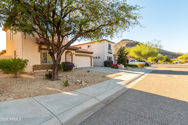 view of front of home with a mountain view