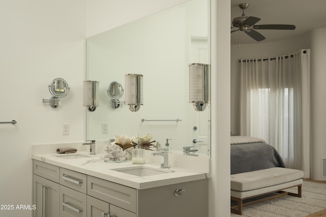 10040 E Happy Valley Rd Unit 1011, Scottsdale, AZ 85255 - ensuite bathroom featuring double vanity and ceiling fan