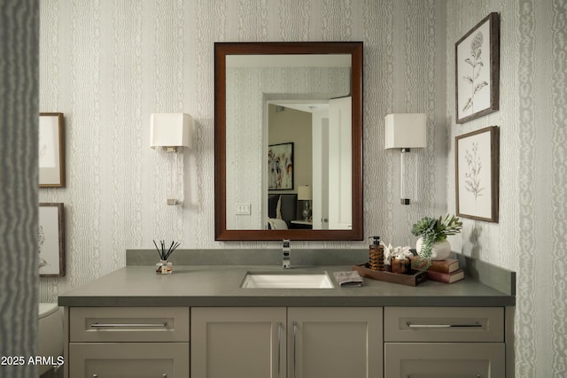 10040 E Happy Valley Rd Unit 1011, Scottsdale, AZ 85255 - bathroom featuring wallpapered walls, vanity, and toilet