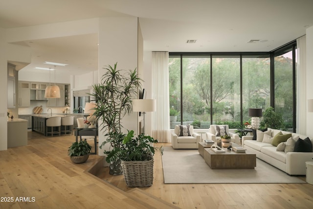 10040 E Happy Valley Rd Unit 1011, Scottsdale, AZ 85255 - lobby with expansive windows and a sink