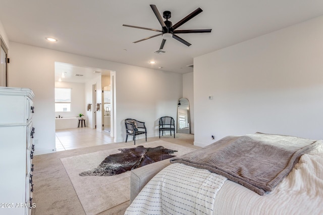 bedroom featuring recessed lighting, light colored carpet, visible vents, and light tile patterned floors